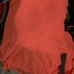 Brand new tag still on  orange shirt